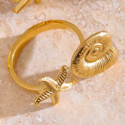 Adjustable gold ring featuring starfish and conch shell design, waterproof and hypoallergenic