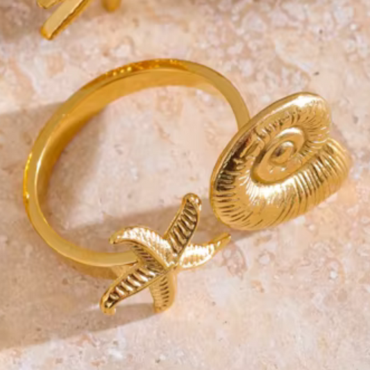 Adjustable gold ring featuring starfish and conch shell design, waterproof and hypoallergenic