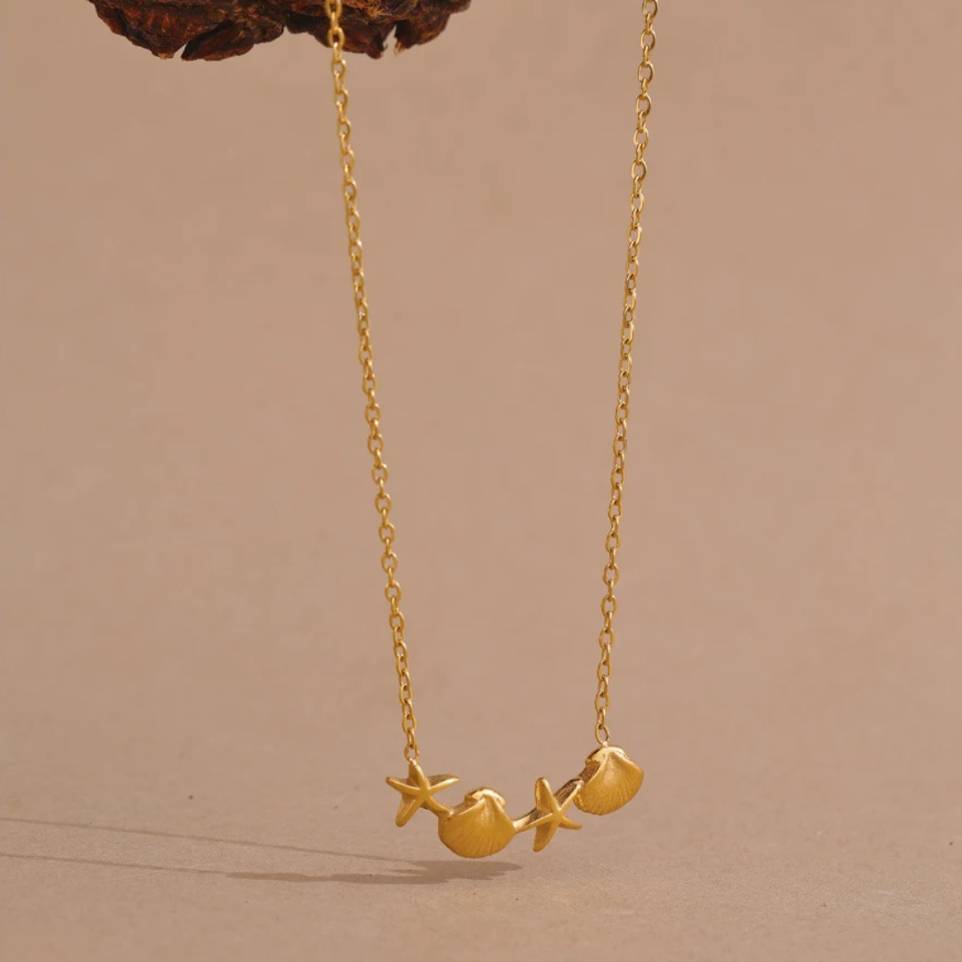 mall  minimalist starfish and shell pendant necklace in waterproof PVD 18K gold finish

